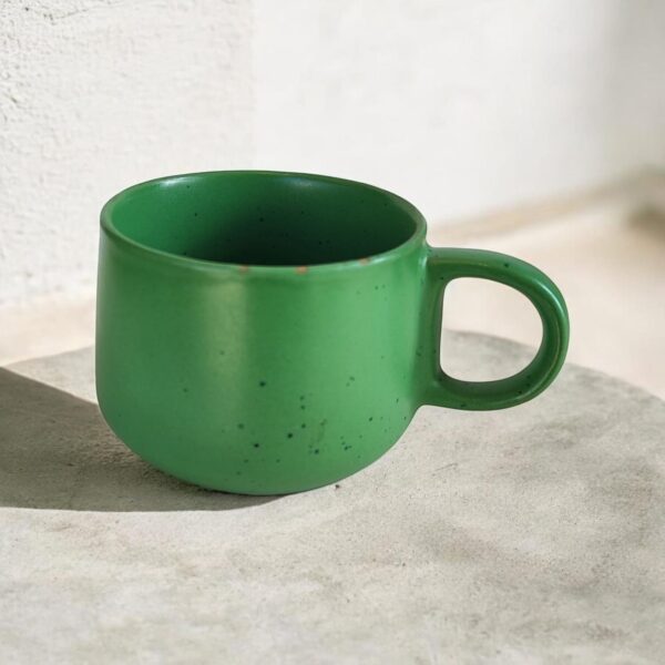 green ceramic mug
